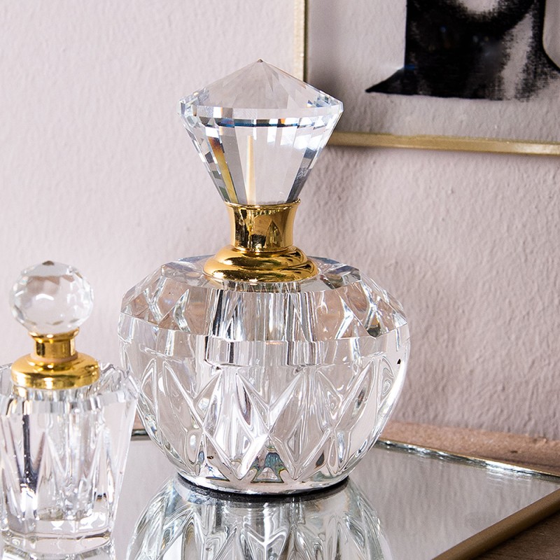 https://www.milatonie.com/5002193-large_default/perfume-bottle-447-cm-transparent-glass-round-round-melady-mlpf0008.jpg